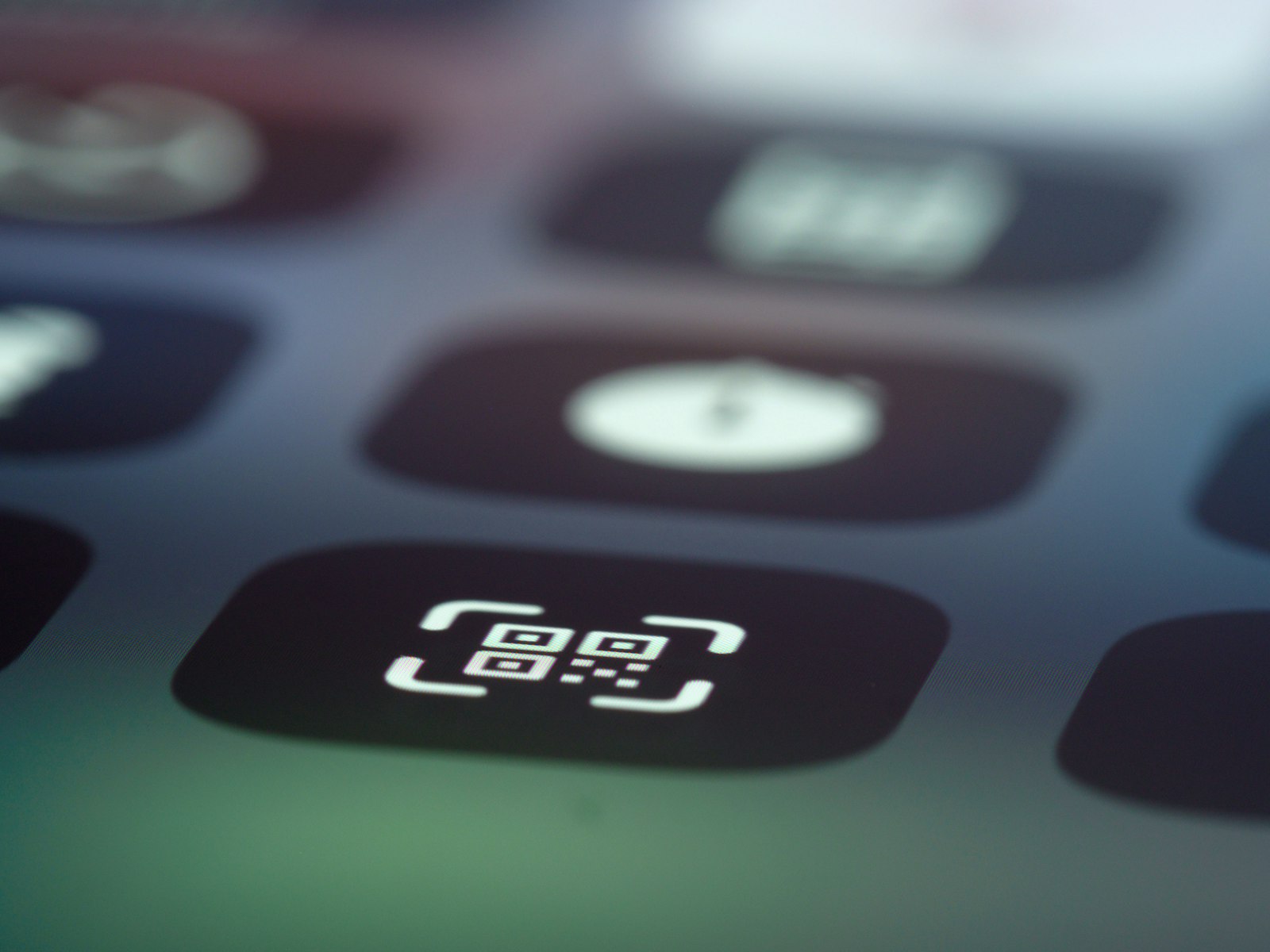 smartphone screen with QR code scanner icon