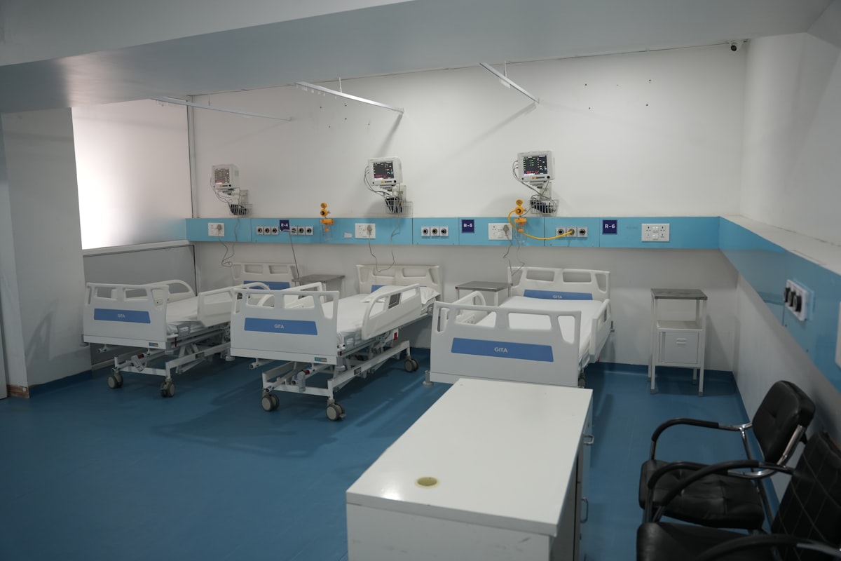 Bright hospital ward with modern patient monitors